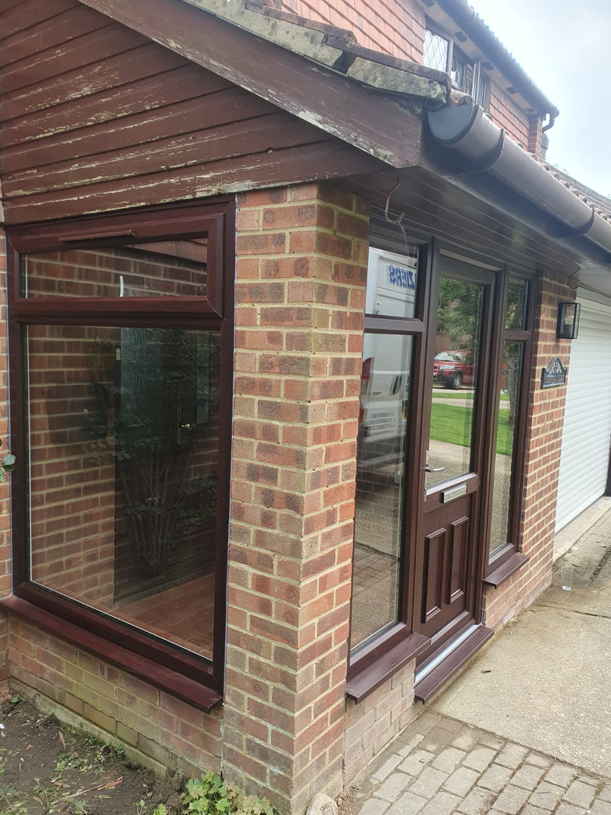 Rosewood on white UPVC porch- (St Leonards on sea)